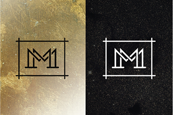 Les deux logos designs et chics (version noire et version blanche) du bar de nuit Le M
